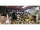 Messy interior space with old furniture and scattered debris at 224 Charlotte St, York, SC 29745