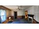 Living room with neutral walls, a fireplace, and natural light at 224 Charlotte St, York, SC 29745