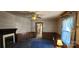 Cozy living room with a fireplace and doorway to the next room at 224 Charlotte St, York, SC 29745