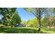 Expansive yard and mature trees surrounding a partially renovated home at 224 Charlotte St, York, SC 29745