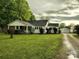 Charming single-Gathering home with a well-manicured lawn, front porch, and long driveway at 2508 S Main St # 68, Concord, NC 28027