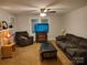 Comfortable living room with neutral walls, a ceiling fan, and ample seating at 2508 S Main St # 68, Concord, NC 28027