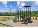 Community playground area featuring a play structure, slide, and seating for families to enjoy at 286 Bezelle Ave, York, SC 29745