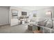 Cozy living room features a comfortable sofa, workspace, and a window with natural light at 290 Bezelle Ave, York, SC 29745