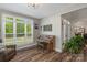 Bright sitting room featuring a piano, gray walls and hardwood floors at 3011 Waxhaw Crossing Dr, Waxhaw, NC 28173