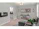 Sitting room with a desk, a mirror and a small view into the en-suite bathroom at 3011 Waxhaw Crossing Dr, Waxhaw, NC 28173