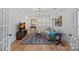 Cozy living room with hardwood floors, stylish furnishings, and plantation shutters creating a relaxing atmosphere at 3228 E Ford Rd, Charlotte, NC 28205