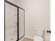 Modern bathroom featuring glass enclosed shower and toilet at 3330 Strong Box Ln, Gastonia, NC 28052