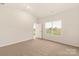 Bright bedroom featuring carpet and a view of the backyard at 3330 Strong Box Ln, Gastonia, NC 28052