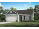 Inviting single-story home with a two-car garage and a well-maintained front lawn at 3330 Strong Box Ln, Gastonia, NC 28052