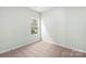 Comfortable bedroom with view of the outside, ample natural light, and plush carpet at 3435 Saddlebred Dr, Gastonia, NC 28052