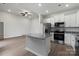 Bright kitchen with stainless steel appliances, granite countertops, and a functional center island at 3435 Saddlebred Dr, Gastonia, NC 28052