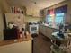 Kitchen with appliances, cabinetry, and windows for light at 3603 Nc 90 E Hwy, Taylorsville, NC 28681