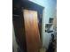 A view of the laundry area with a washing machine next to a partially open closet with a wooden door at 3603 Nc 90 E Hwy, Taylorsville, NC 28681