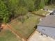 Aerial view of a large, fenced backyard featuring a playset and patio area at 367 Neely Store Rd, Rock Hill, SC 29730