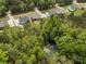 Aerial view of a neighborhood showcasing the lush greenery and a serene pond at 367 Neely Store Rd, Rock Hill, SC 29730