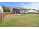 Expansive backyard features a screened porch, patio, and a well-maintained lawn at 367 Neely Store Rd, Rock Hill, SC 29730