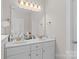 Bright bathroom featuring double sinks, modern fixtures, and a large mirror at 367 Neely Store Rd, Rock Hill, SC 29730