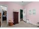 A charming pink bedroom features a decorative ceiling and coordinating decor at 367 Neely Store Rd, Rock Hill, SC 29730