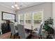Bright dining room features large windows, stylish furniture, and a decorative 'Bless the Food' sign at 367 Neely Store Rd, Rock Hill, SC 29730