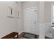 Welcoming foyer with hardwood floors, bench seating, and tasteful decor creates a warm entrance at 367 Neely Store Rd, Rock Hill, SC 29730