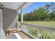 Expansive front porch view overlooking well-maintained lawn and lush greenery, perfect for serene outdoor living at 367 Neely Store Rd, Rock Hill, SC 29730