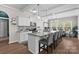 Modern kitchen with granite counters, large island with seating, and open layout ideal for entertaining at 367 Neely Store Rd, Rock Hill, SC 29730