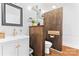 Modern bathroom with a stylish vanity and wood accents at 36984 B&C Carter Rd, New London, NC 28127