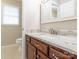 Bathroom featuring a dark wood vanity at 3815 Glen Haven Sw Dr, Concord, NC 28027