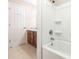 Clean bathroom with a white tub at 3815 Glen Haven Sw Dr, Concord, NC 28027