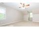 Large bedroom with neutral walls and carpet at 3815 Glen Haven Sw Dr, Concord, NC 28027