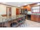 Well-equipped kitchen with a center island, granite countertops, and stainless steel appliances at 3815 Glen Haven Sw Dr, Concord, NC 28027