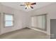 Bedroom with neutral carpeting, natural light, and ceiling fan at 441 Kimbrook Ct, Rock Hill, SC 29730