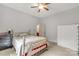 Neutral bedroom with a bed, dresser, and a view into the bathroom at 441 Kimbrook Ct, Rock Hill, SC 29730