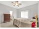 Cozy bedroom featuring neutral walls, ceiling fan, carpet, and dresser at 441 Kimbrook Ct, Rock Hill, SC 29730