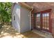 Open wood deck area with double doors into the brick house and a fenced in portion of the deck at 441 Kimbrook Ct, Rock Hill, SC 29730
