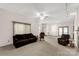 Open living room featuring neutral paint, ceiling fan, and access to the outdoors at 441 Kimbrook Ct, Rock Hill, SC 29730