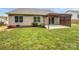 Backyard with a patio, pergola, and well-maintained lawn at 526 Pennyfields Ln, Clover, SC 29710