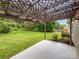 Spacious backyard features a patio with a pergola and lush green grass at 526 Pennyfields Ln, Clover, SC 29710