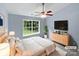 Main bedroom featuring a vaulted ceiling, large windows, and modern flooring at 526 Pennyfields Ln, Clover, SC 29710