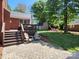 Beautiful backyard with a patio, deck, and shed; ideal for outdoor activities at 5505 Weavers Row, Gastonia, NC 28056