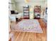 Bright bedroom featuring hardwood floors, natural light, and ample space, ideal for a comfortable and stylish living at 5505 Weavers Row, Gastonia, NC 28056