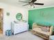 Charming Bedroom with modern decor, including a crib and a changing table at 5505 Weavers Row, Gastonia, NC 28056