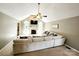 Bright living room featuring high ceilings, a fireplace, and ample seating, perfect for relaxing and entertaining guests at 5505 Weavers Row, Gastonia, NC 28056