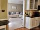 Open-concept living room with a view into the kitchen, providing a seamless flow and inviting atmosphere for modern living at 5505 Weavers Row, Gastonia, NC 28056