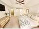 Spacious main bedroom with a tray ceiling, an upholstered bed, and plenty of natural light at 5505 Weavers Row, Gastonia, NC 28056