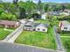 Charming single-story home with a well-manicured lawn and mature trees at 7410 Middlebury Pl, Charlotte, NC 28212