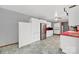 Bright kitchen features white cabinets and a stainless steel refrigerator at 7410 Middlebury Pl, Charlotte, NC 28212