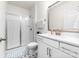 Bright bathroom with a glass enclosed shower, modern vanity, and decorative tile floors at 8143 Warford Little Rd, Denver, NC 28037