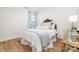 Cozy bedroom features hardwood floors, a comfortable bed, and soft, inviting decor at 8143 Warford Little Rd, Denver, NC 28037